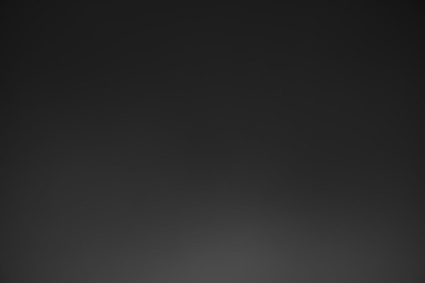 Dark black and gray blurred gradient background has a little abstract light. soft background for wallpaper,design,graphic and presentation, backdrop wall photo