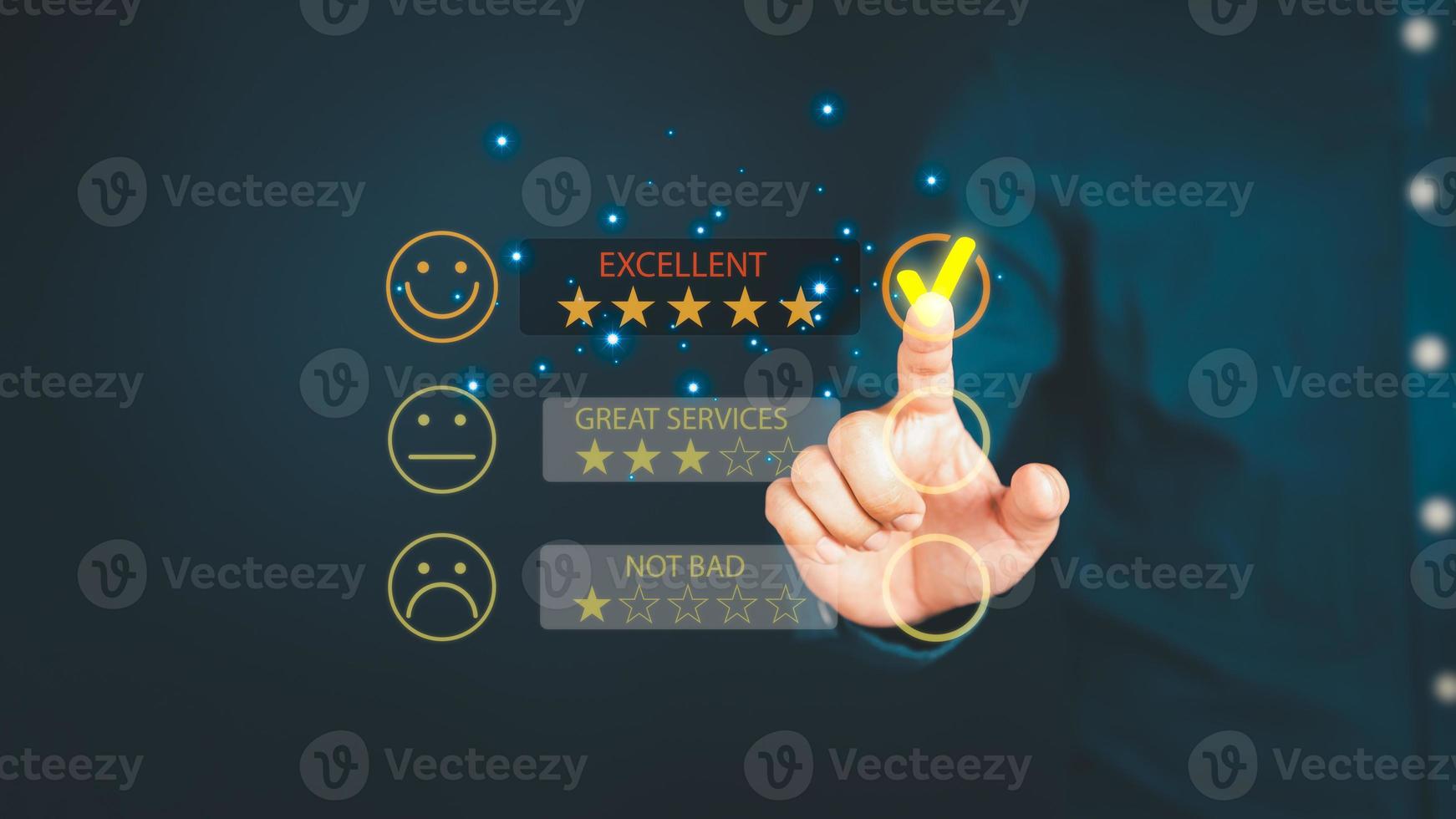 Man touching the virtual screen on the happy smiley face icon to give satisfaction in service. Rating very impressed. Customer service, testimonial satisfaction concept. photo
