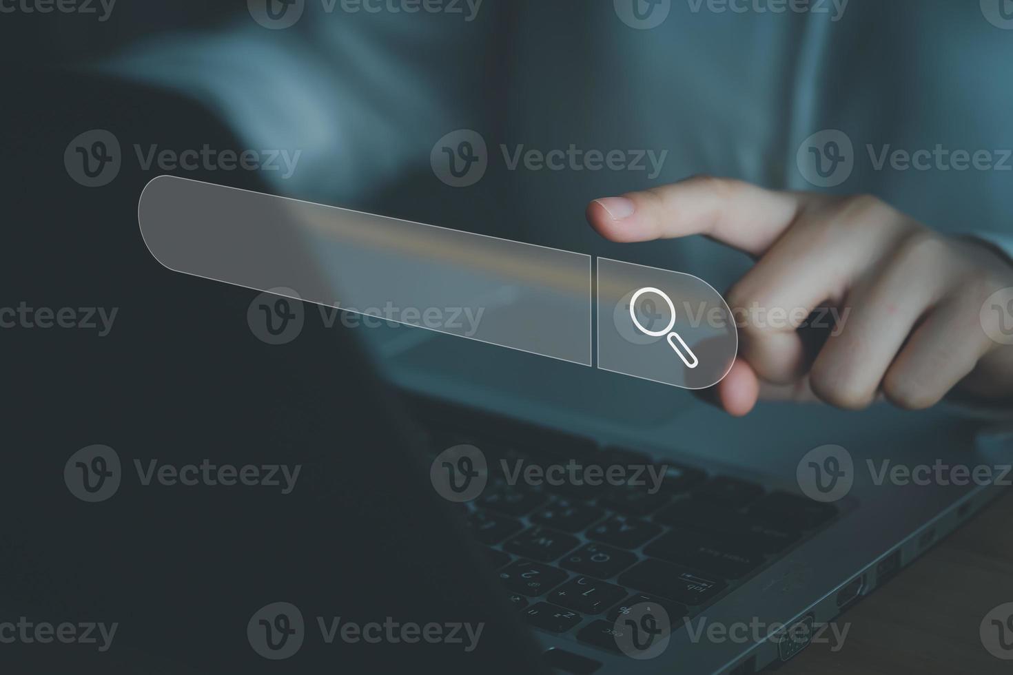 Data Search Technology Search Engine Optimization, SEO. Woman's hands are touch on virtual search bar for surfing the internet and Searching for information on web browser. photo