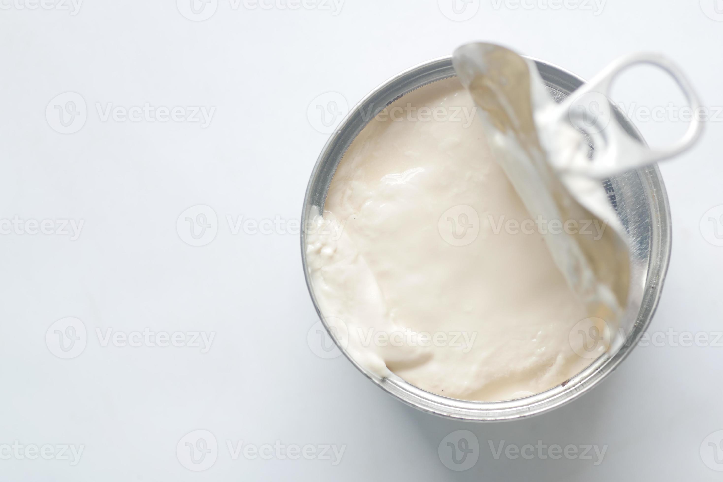 top view of milk cream in a tin container on table 14378932 Stock Photo at Vecteezy