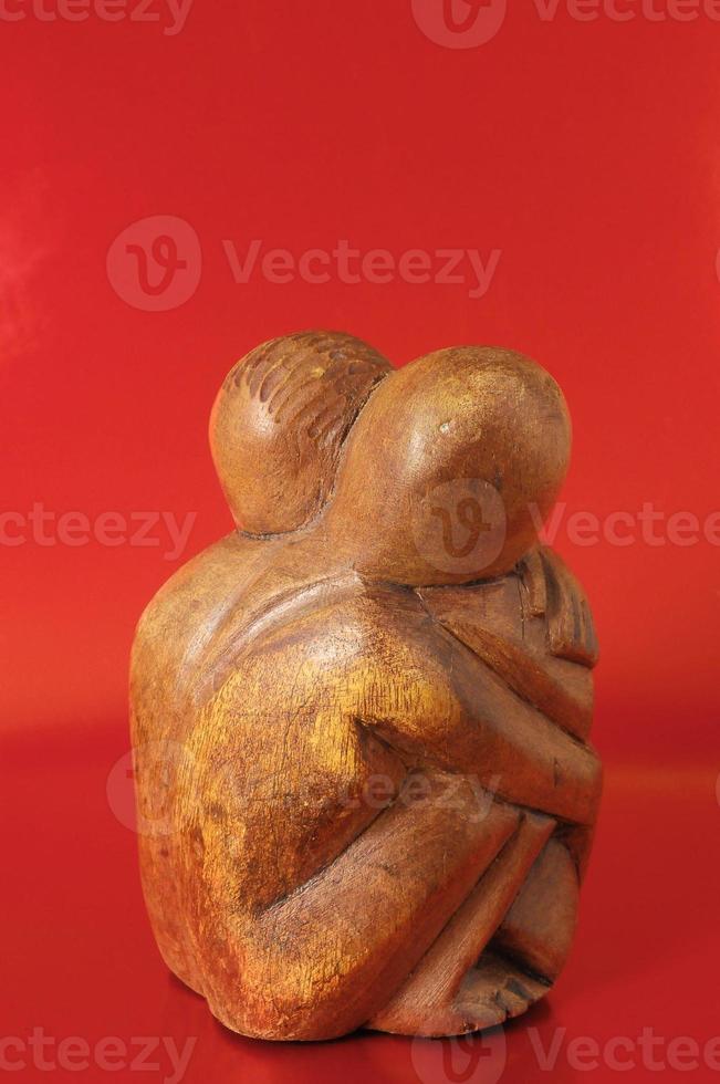 Women statue of people hugging photo