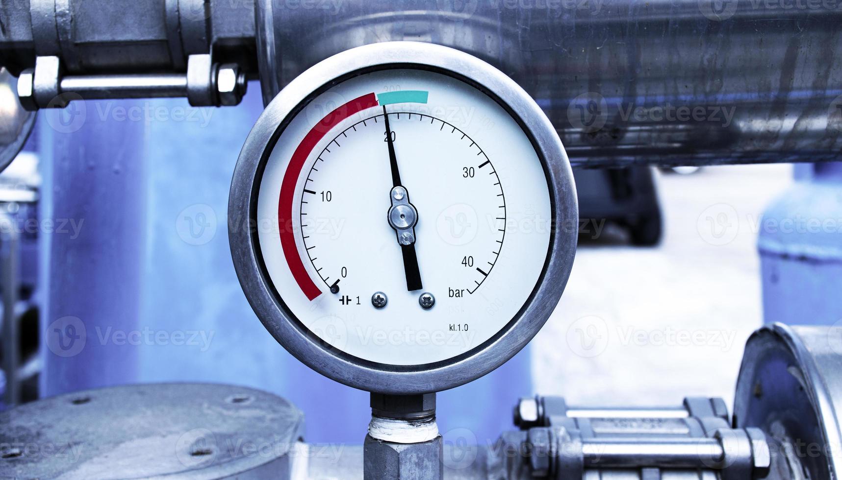 Close up gas pressure meter tubes valves photo