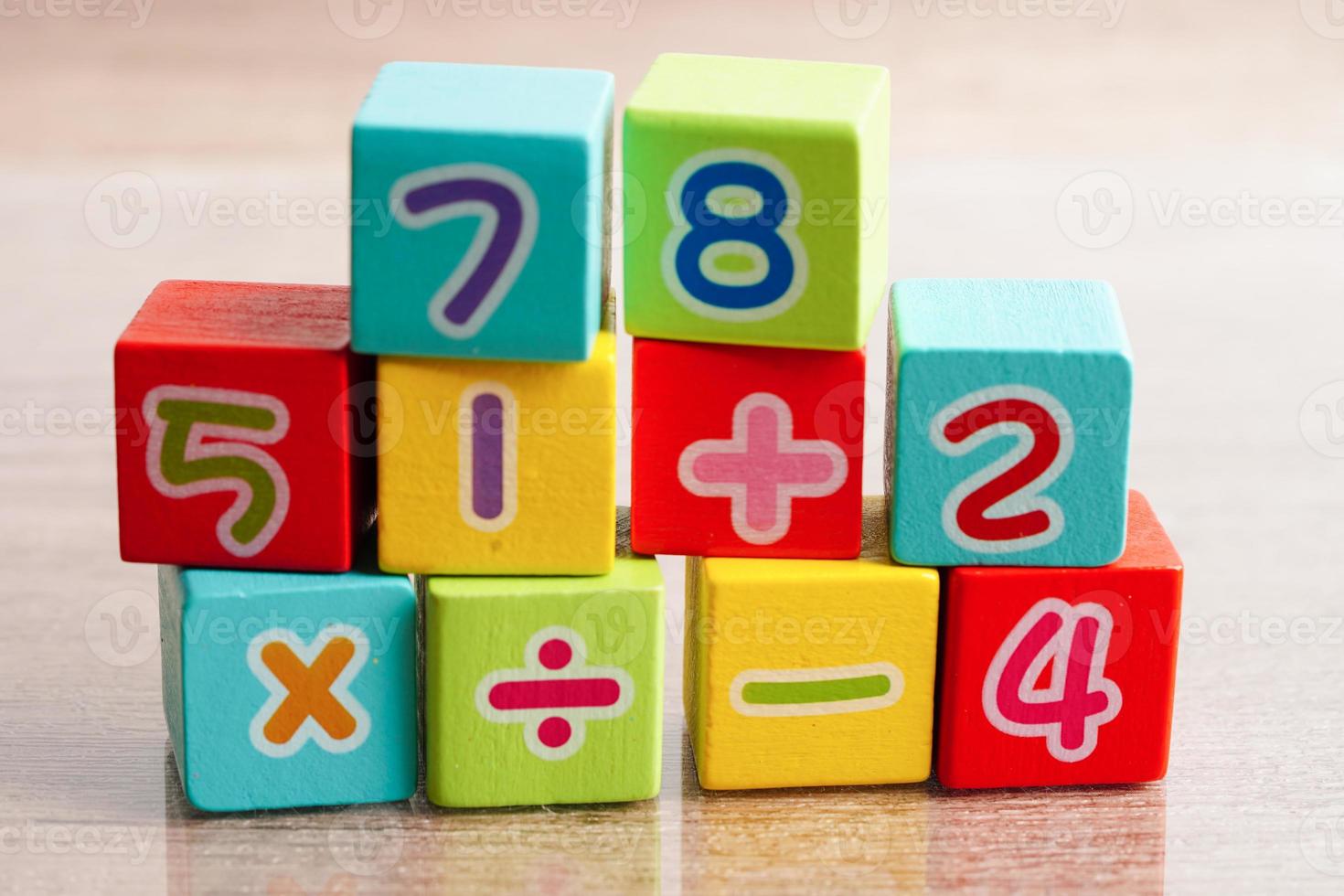 Number wood block cubes for learning Mathematic, education math concept. photo