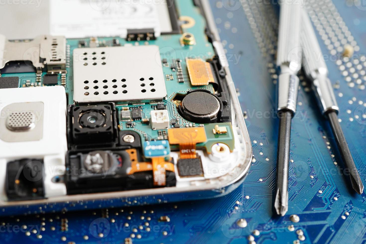 Repairing and upgrade mobile phone, electronic, computer hardware and technology concept. photo