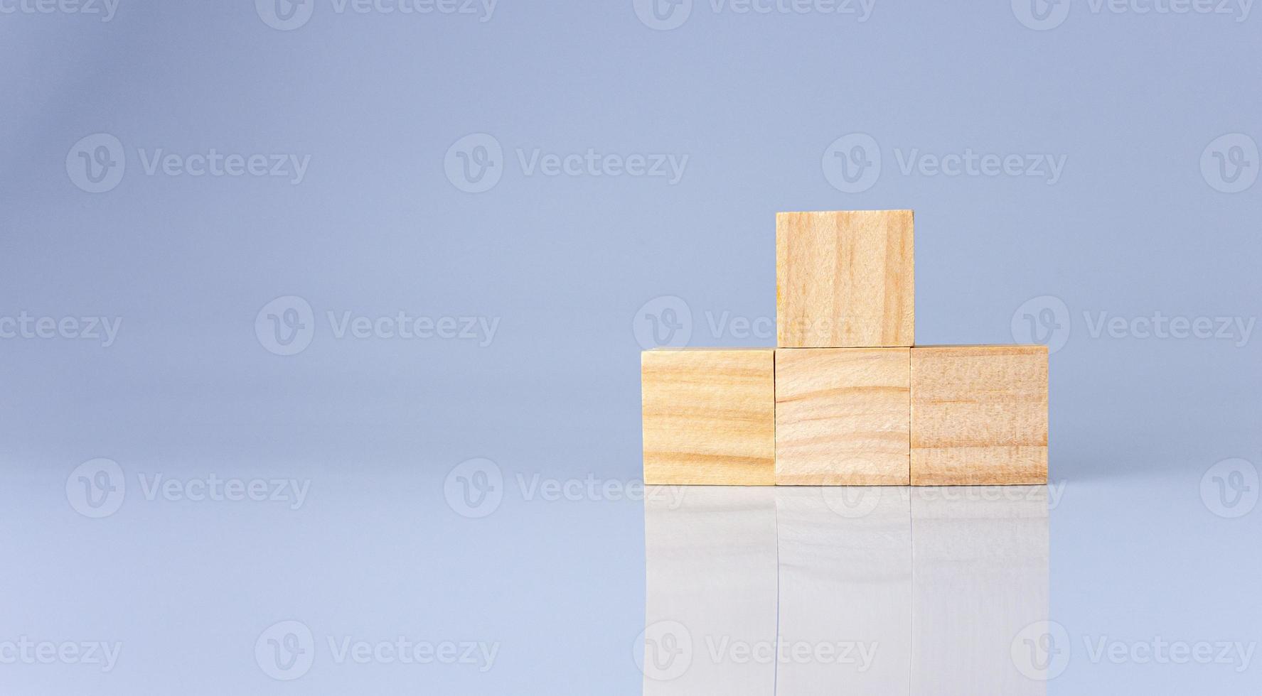 empty wooden blocks lined up on a white background. Business concept. photo