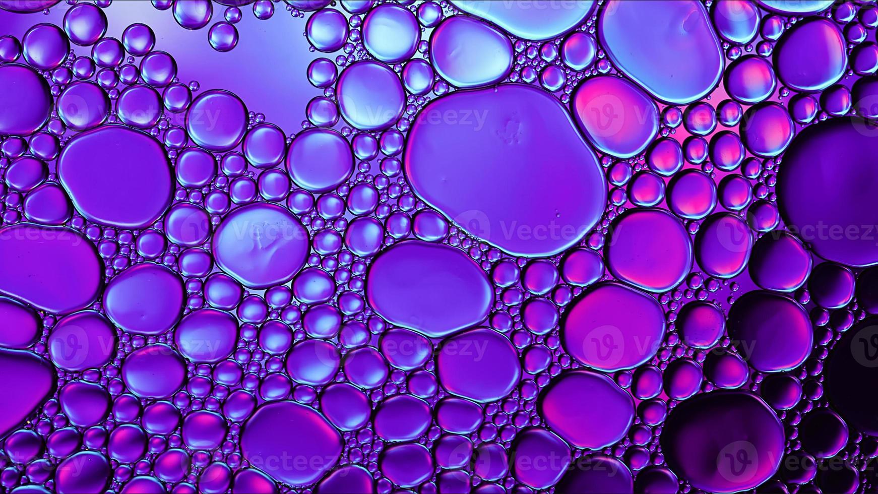 Abstract Colorful Food Oil Drops Bubbles and spheres Flowing on Water Surface photo