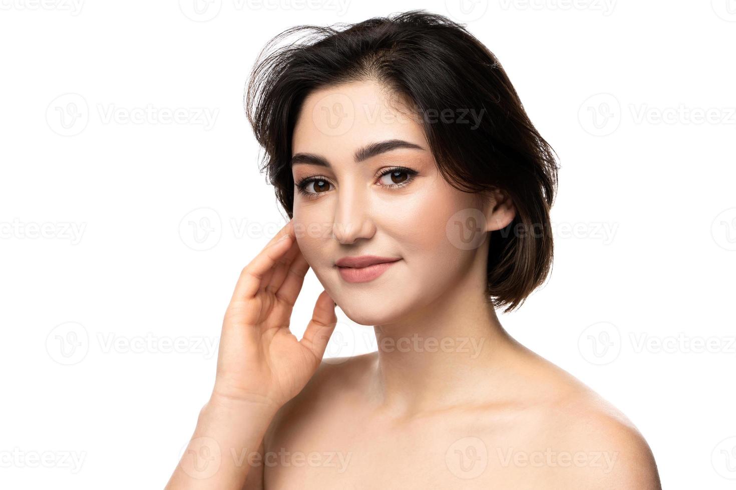 Portrait of young beautiful brunette woman photo
