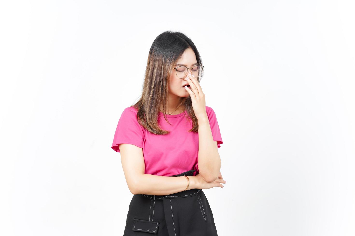 Yawning Gesture of Beautiful Asian Woman Isolated On White Background photo