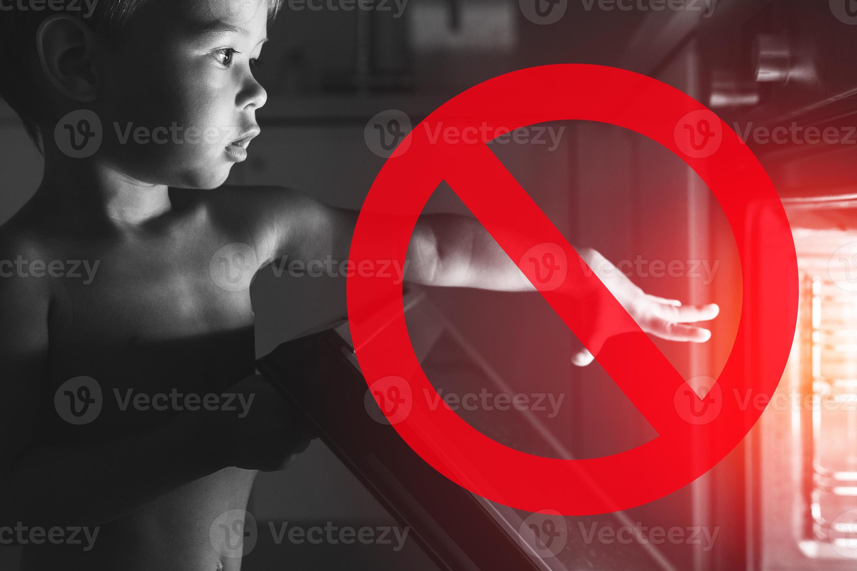 Baby and NO symbol near the oven. Concept of safety and possible