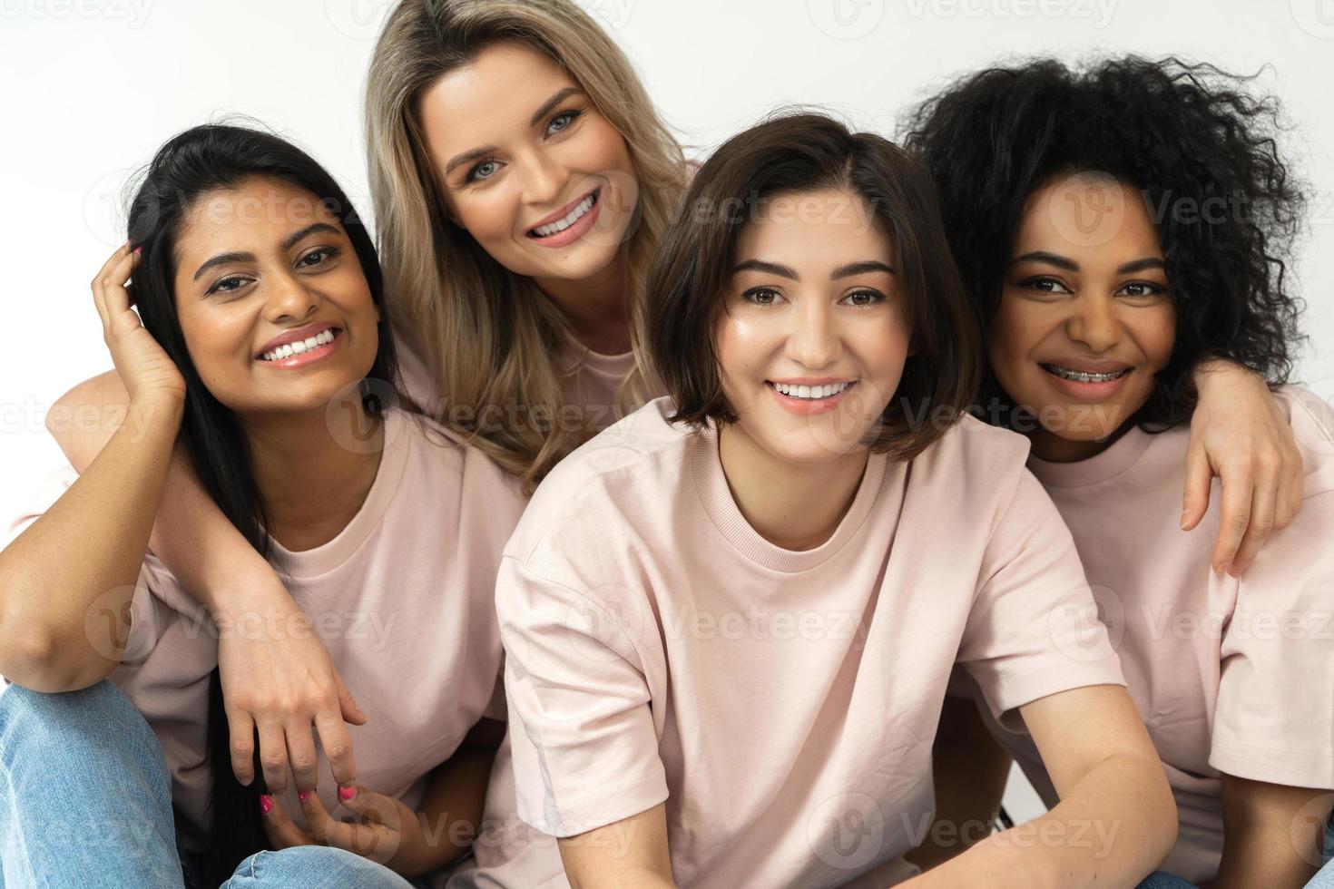 Multicultural diversity and friendship. Group of different ethnicity women. photo