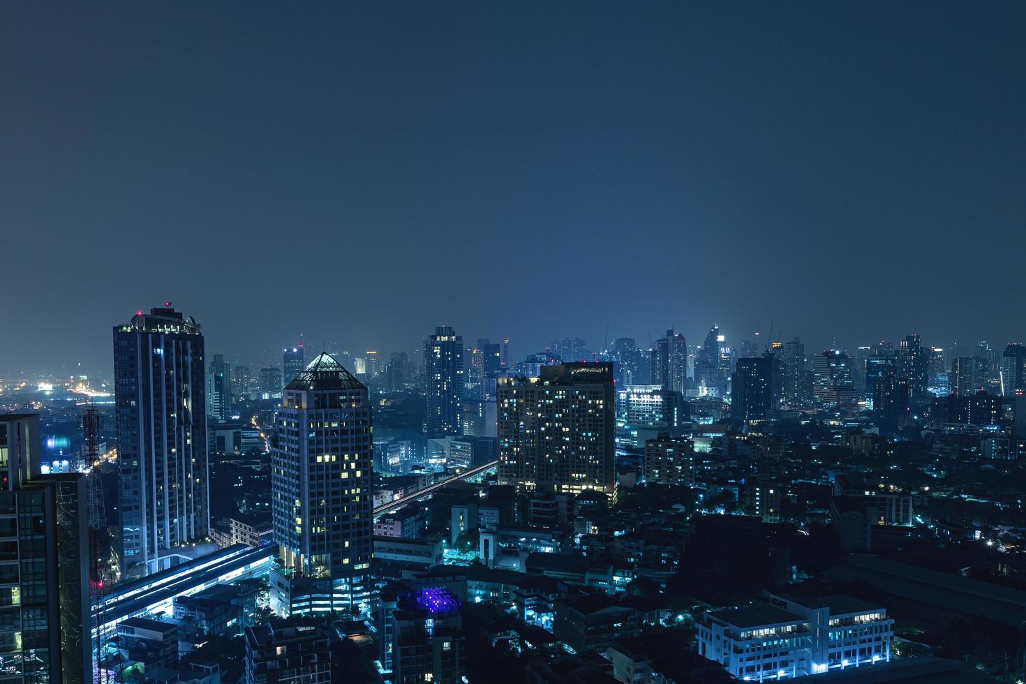 Scenic view of Modern Bangkok city at night photo
