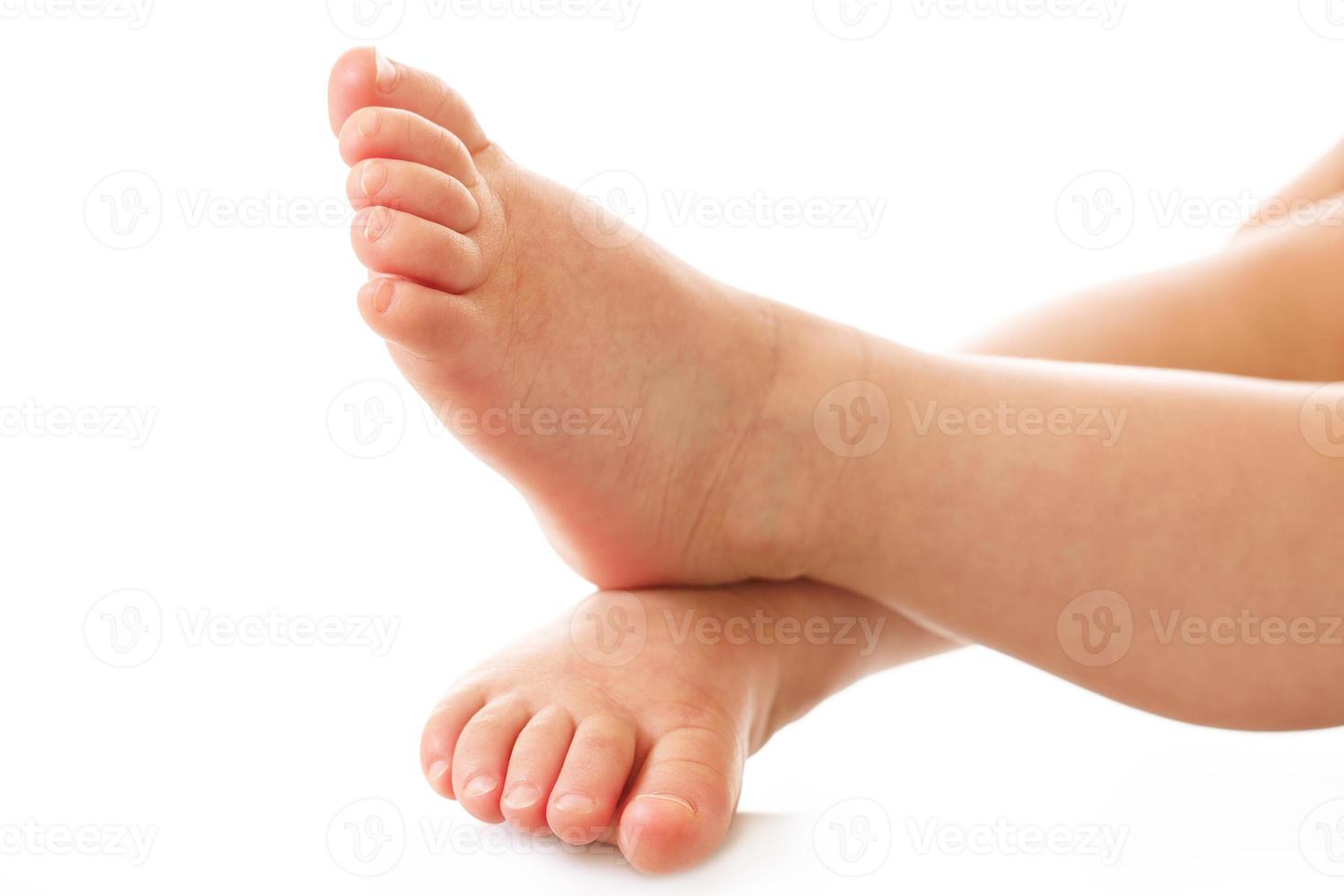 Closeup shot of little child feet and soles. photo