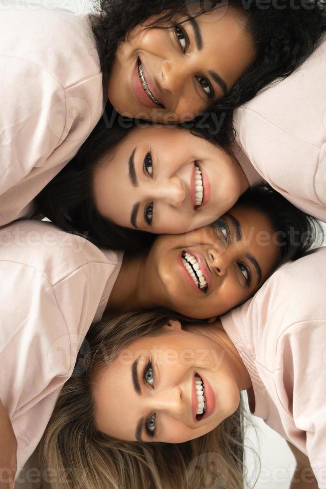 Group of different ethnicity women. Multicultural diversity and friendship. photo