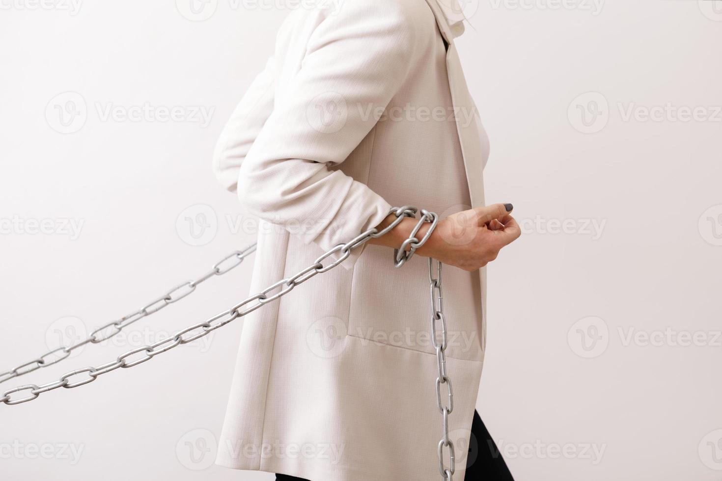 Tired business woman is pulling the chains 14398035 Stock Photo at Vecteezy