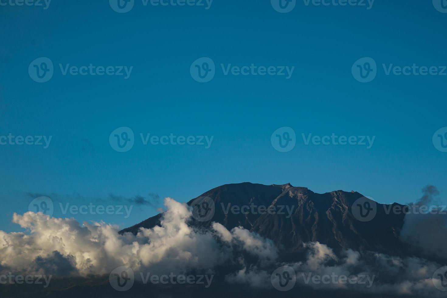 Top of the Agung mountain in the clouds photo