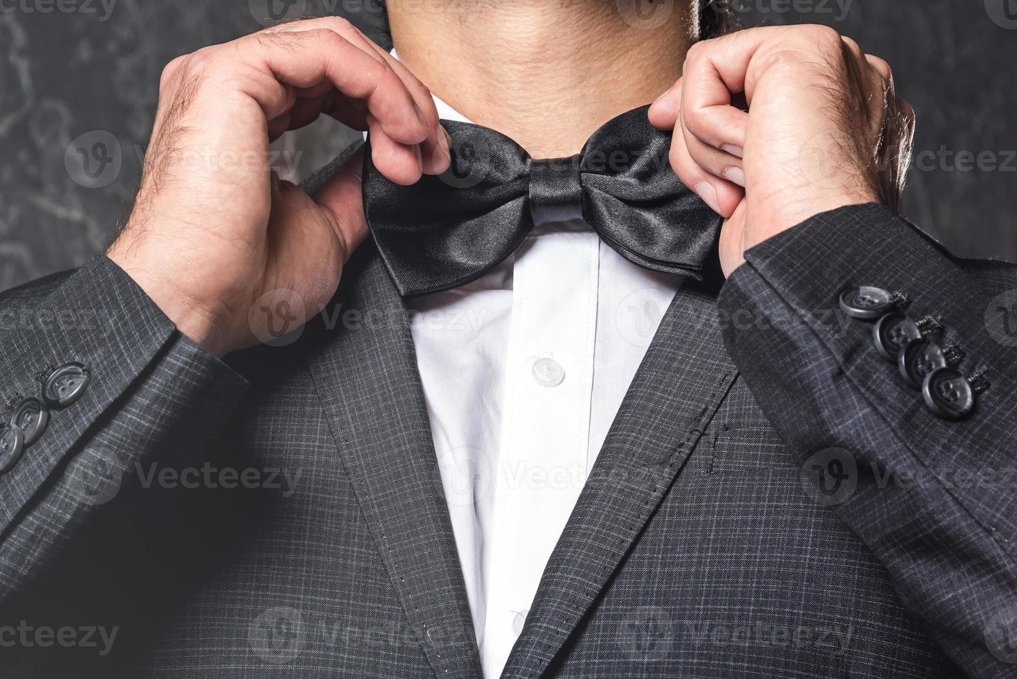 Man wearing bow tie photo