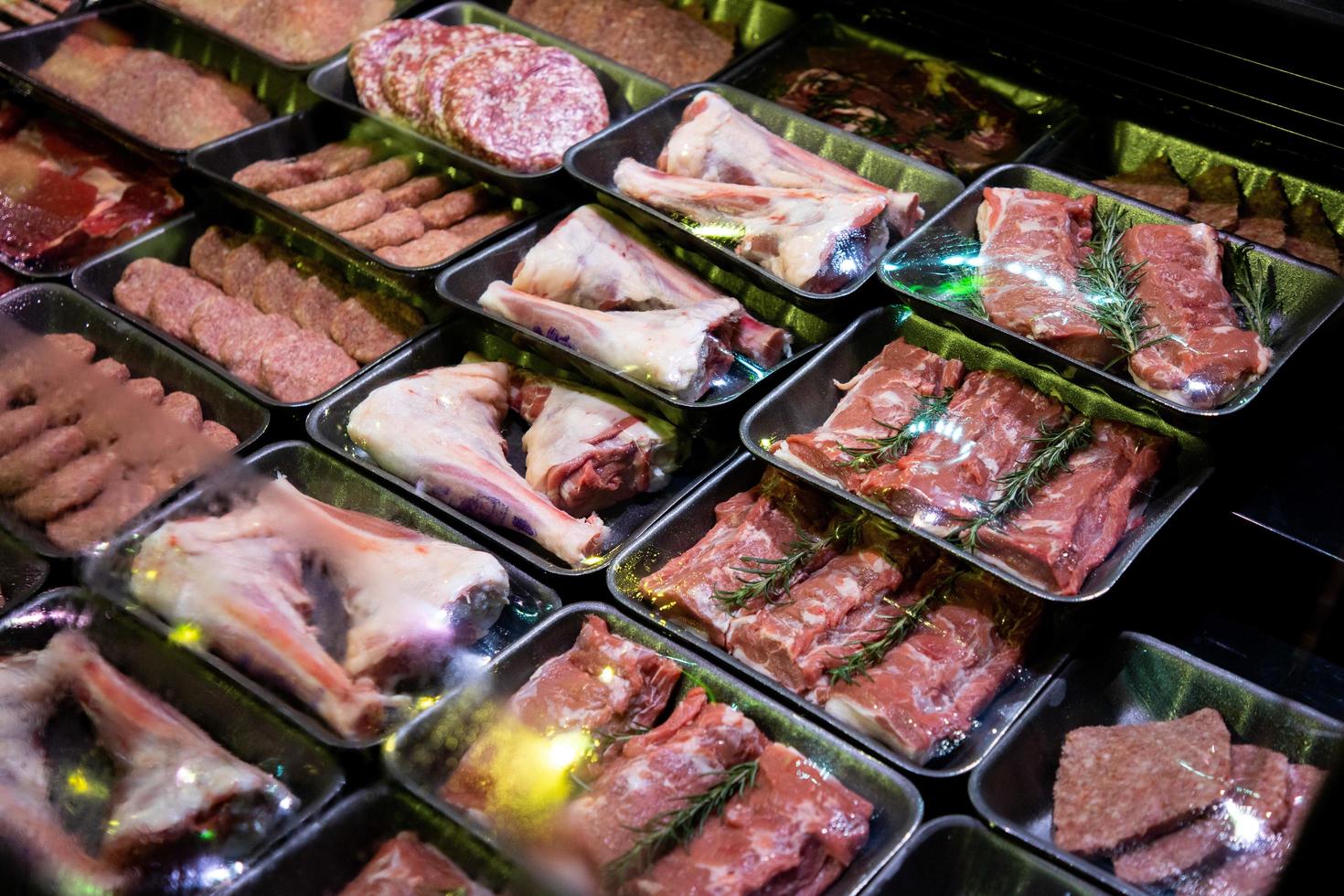 raw meat on the bench in the store photo