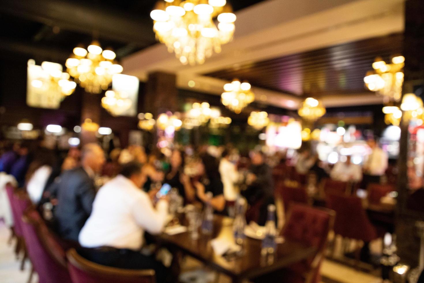 People in the restaurant blurred background photo