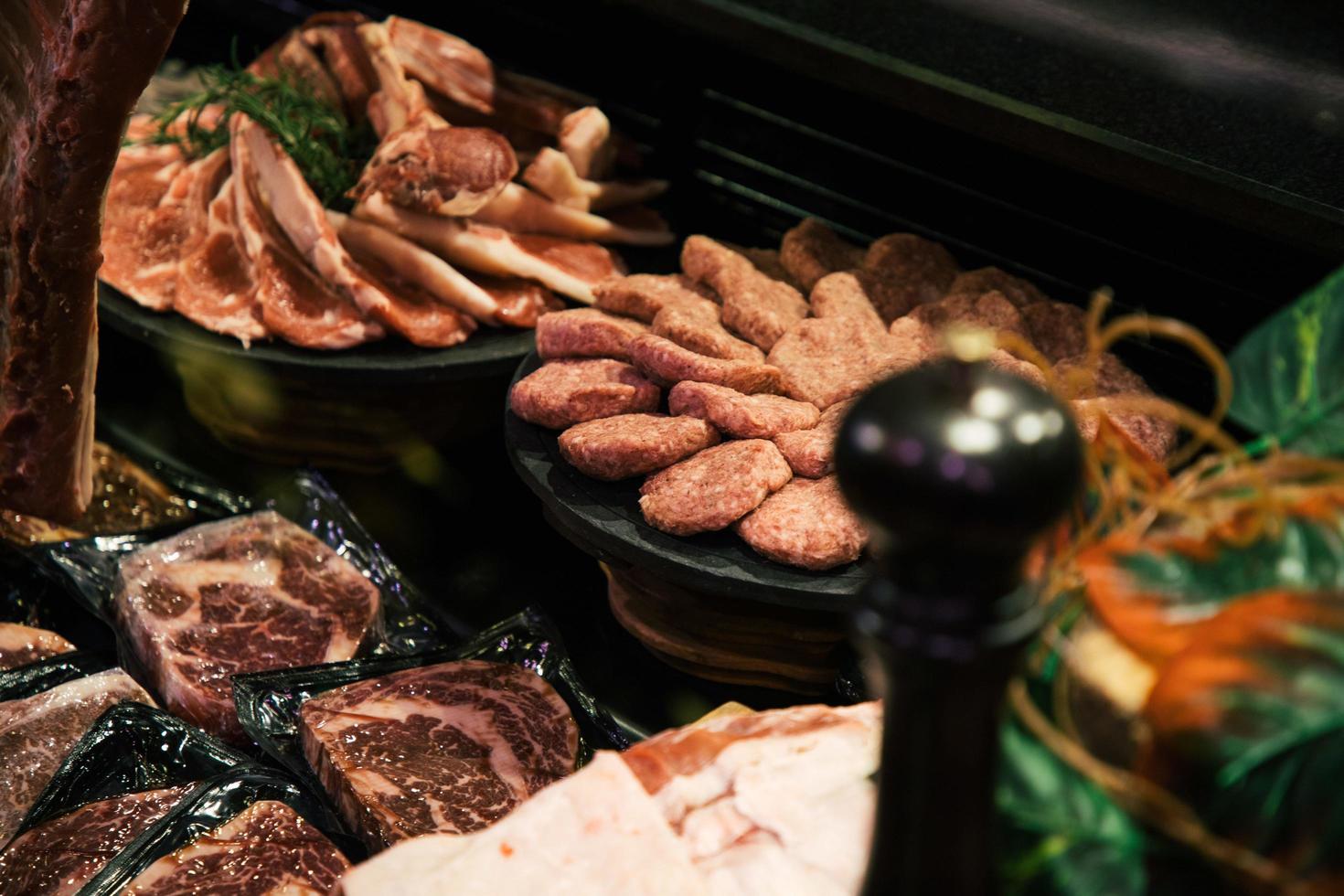 raw meat on the bench in the store photo