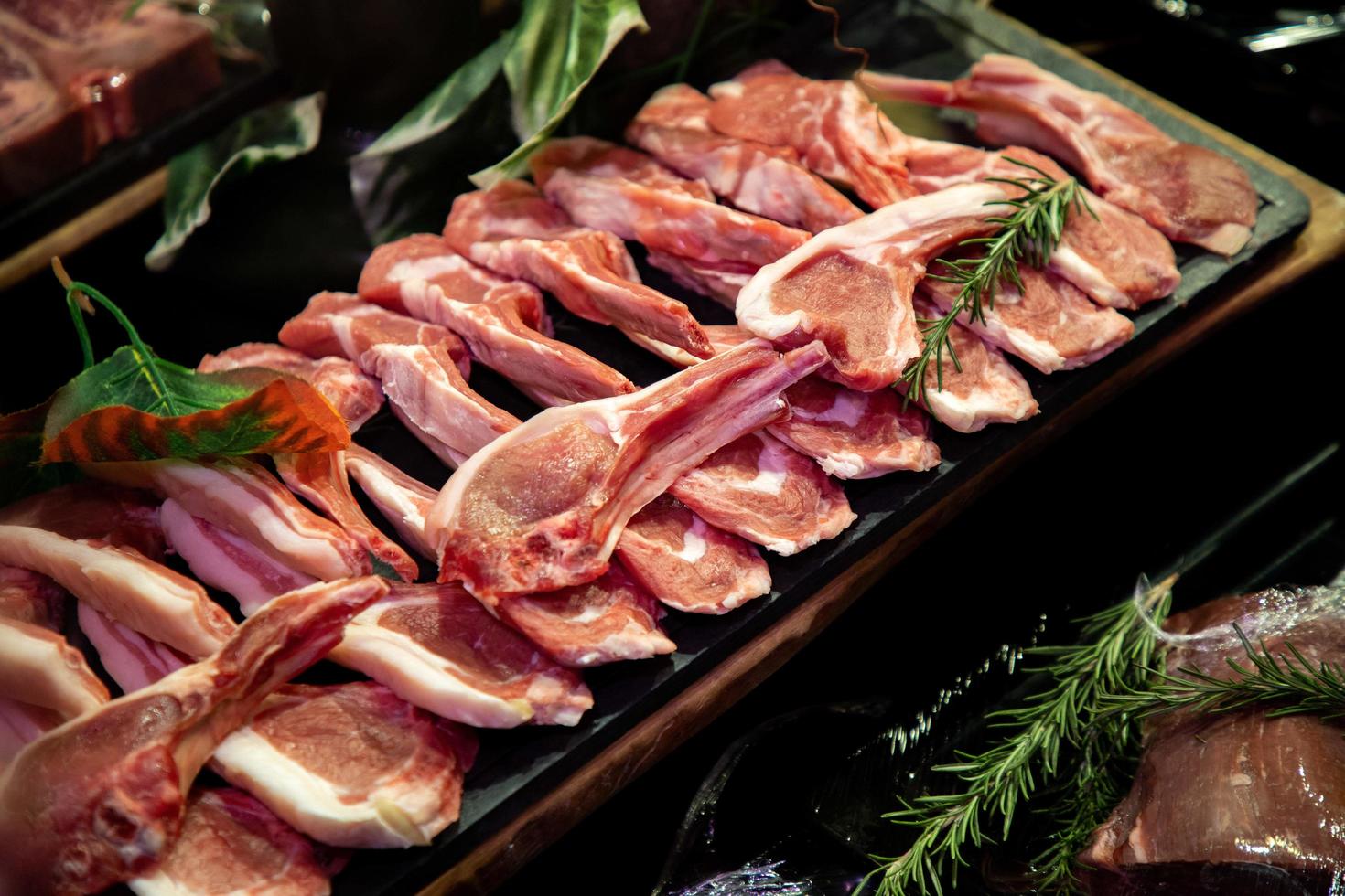 raw meat on the bench in the store photo