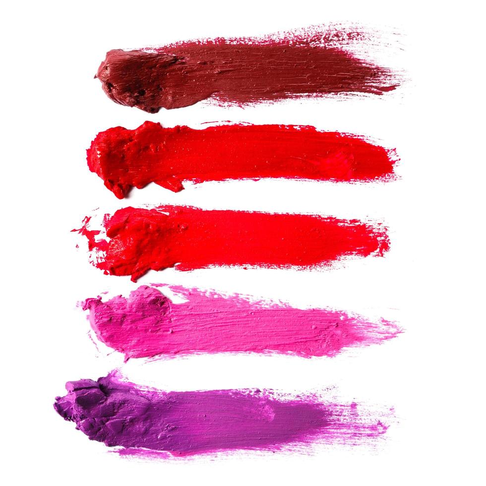 Different multi colored samples of a smudged lipstick photo