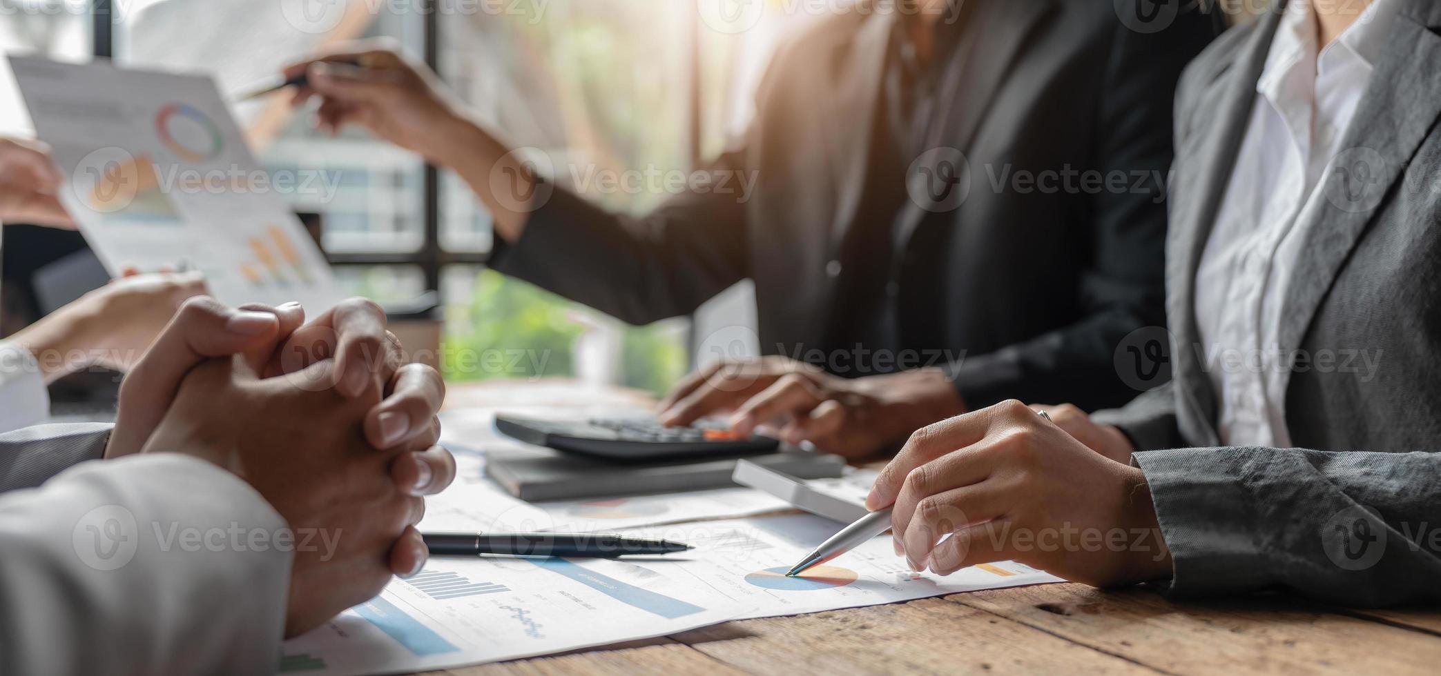 Professional Asian business adviser meeting to analyze and discuss the strategy of financial support of a tech company. Partnership start-up consultant, Indoor business client consultation concept. photo