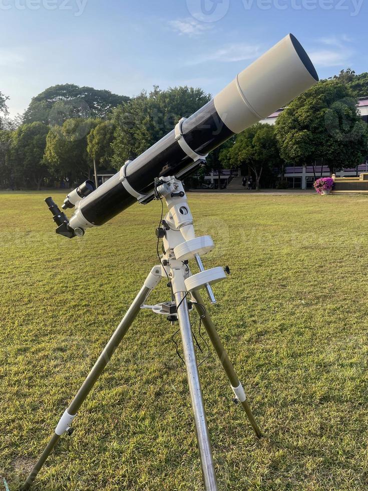 Refractor telescope is a telescope that uses a convex lens to focus light. Soft and selective focus. photo