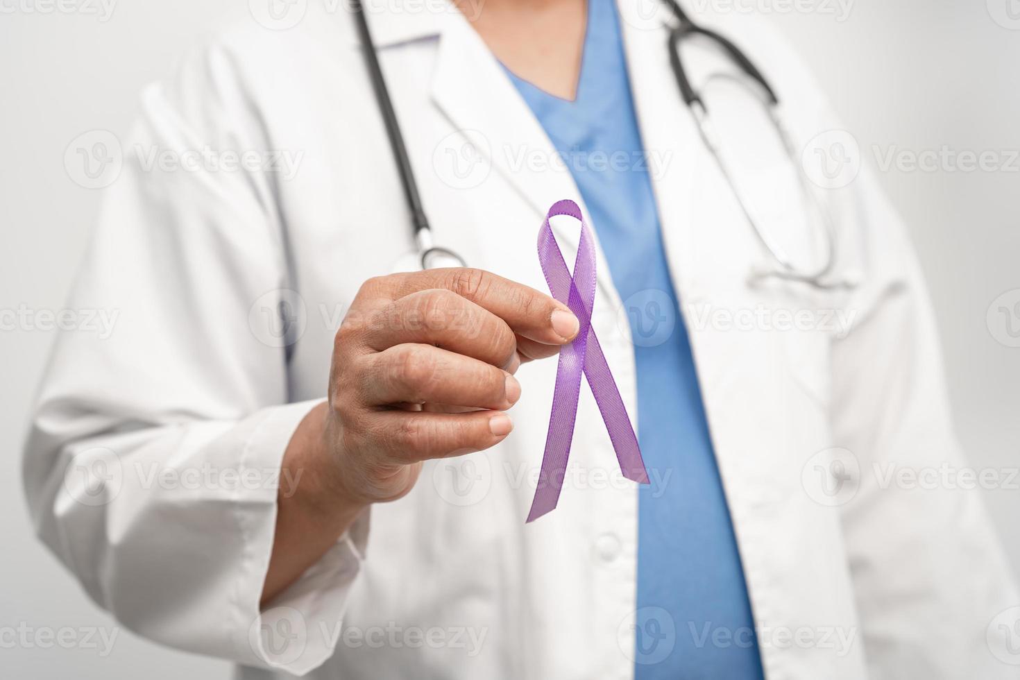 Asian woman doctor with purple ribbon, sign of Alzheimer disease day, Pancreatic cancer, Epilepsy, Lupus. photo