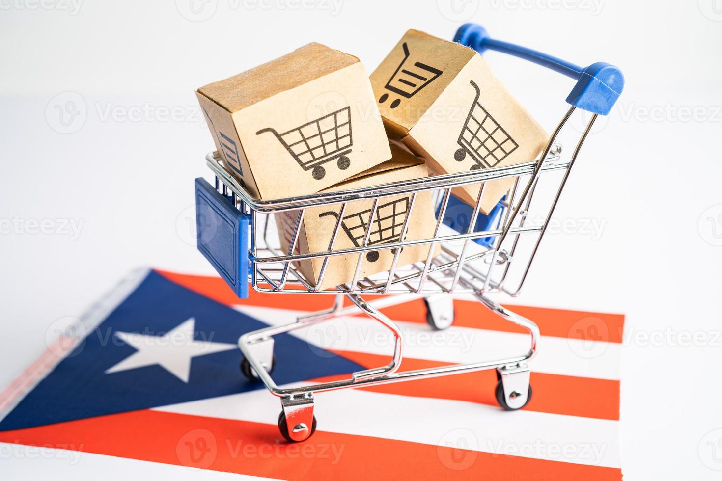 caja con el logotipo del carrito de la compra y la bandera de puerto rico, compras de importación y exportación en línea o servicio de entrega de finanzas de comercio electrónico tienda de envío de productos, comercio, concepto de proveedor. foto