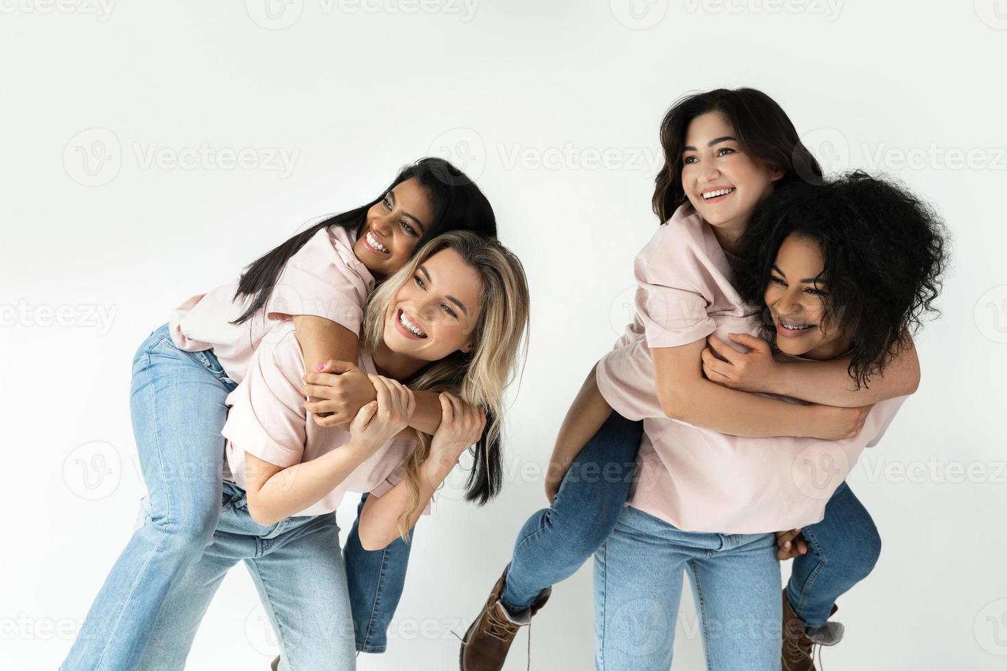 Multicultural diversity and friendship. Group of different ethnicity happy women. photo