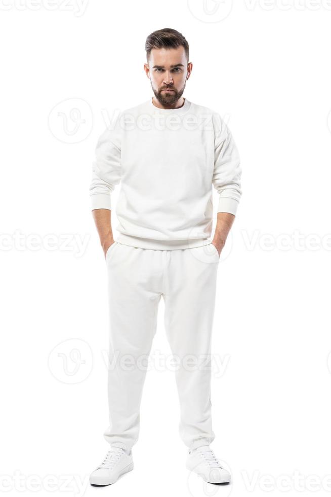 Handsome man wearing blank white clothes on white background photo