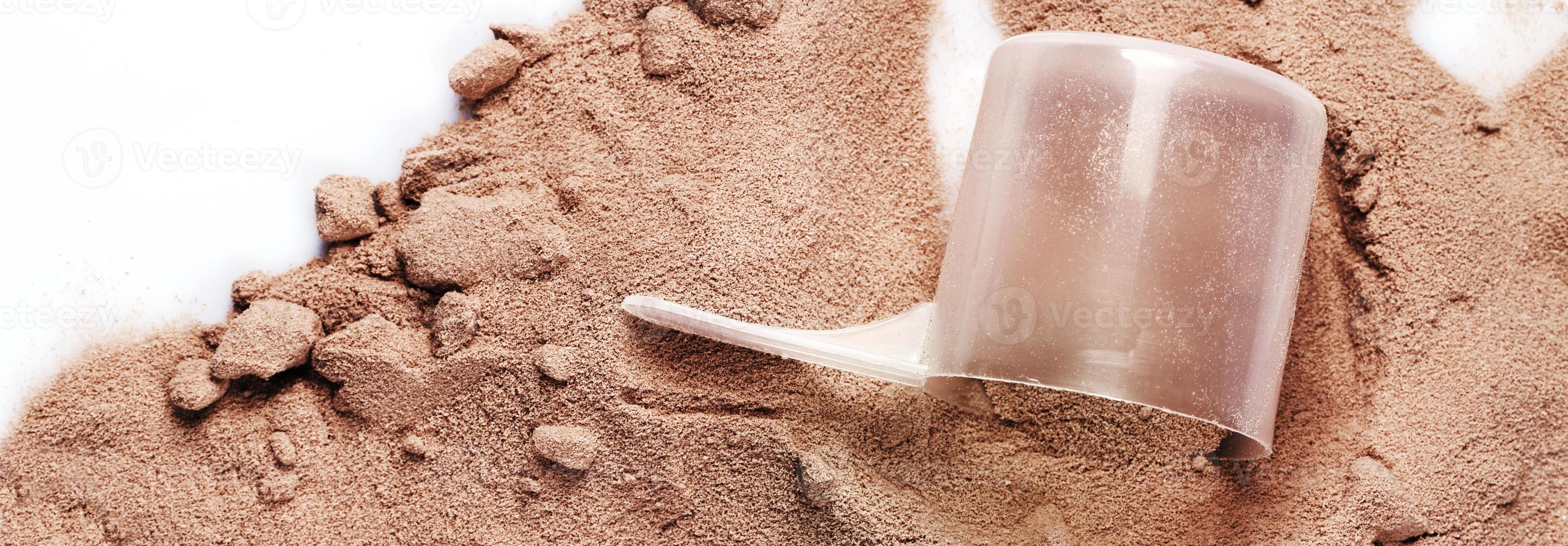 coop con proteína de suero de chocolate o polvo de aumento de masa foto