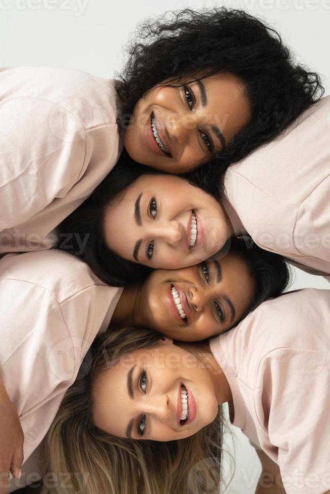 Group of different ethnicity women. Multicultural diversity and friendship. photo