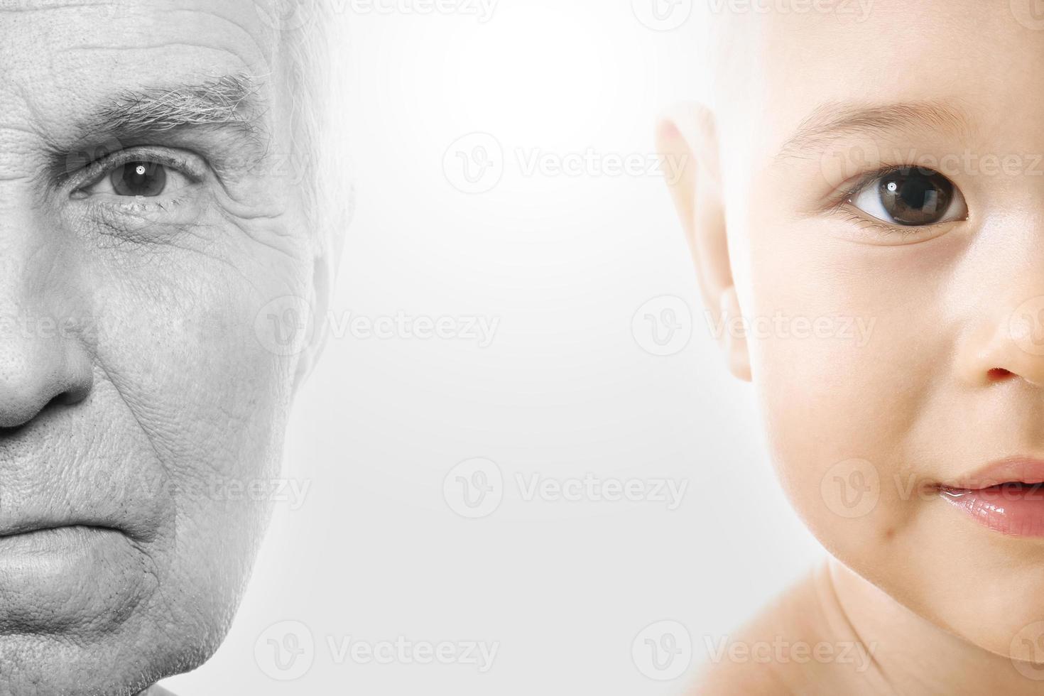 Elderly man and baby boy. Concept of rebirth and cycle of life. photo