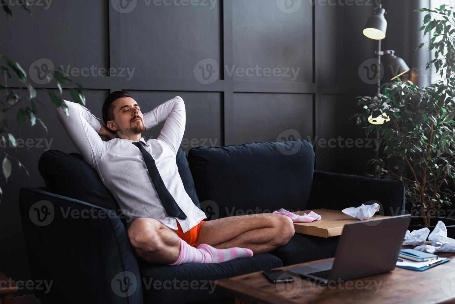 Happy businessman enjoying of distant work at home photo