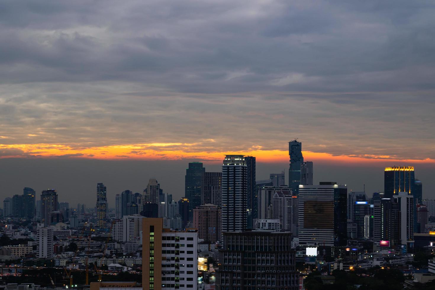 View of the modern Bangkok city during sunset photo