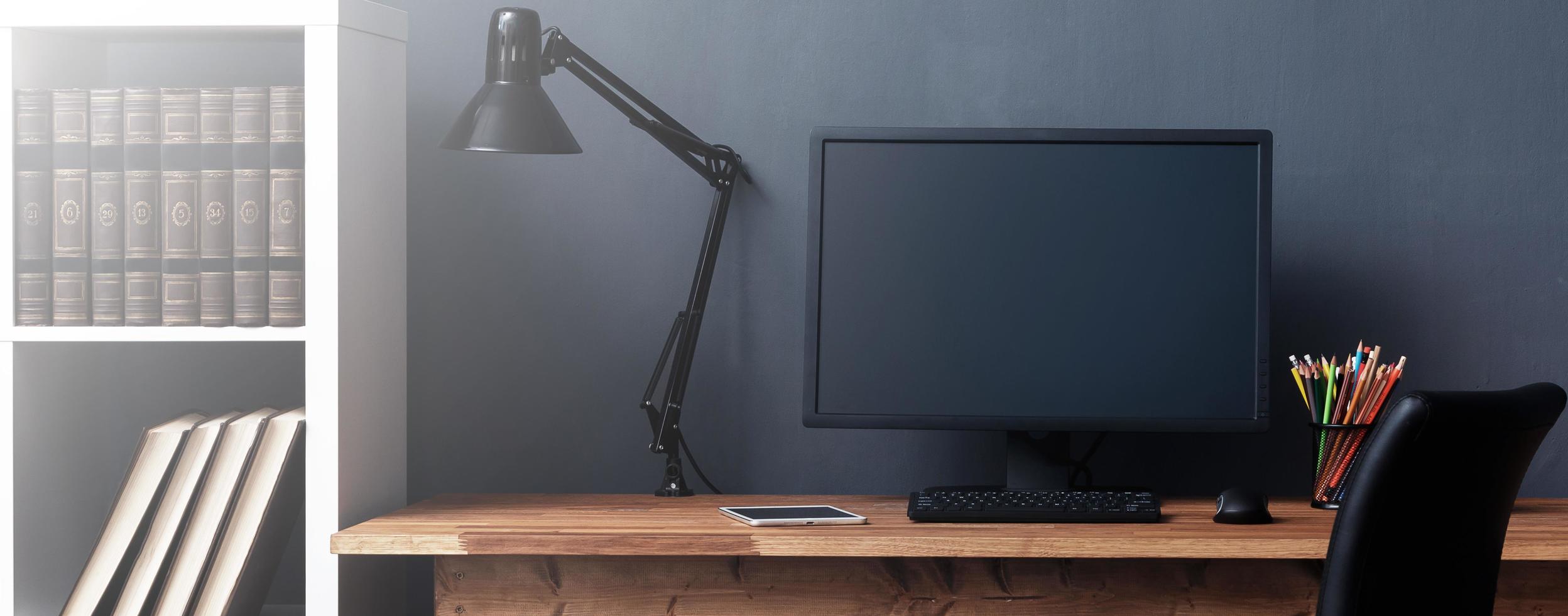 Home workplace desk with computer in the interior photo
