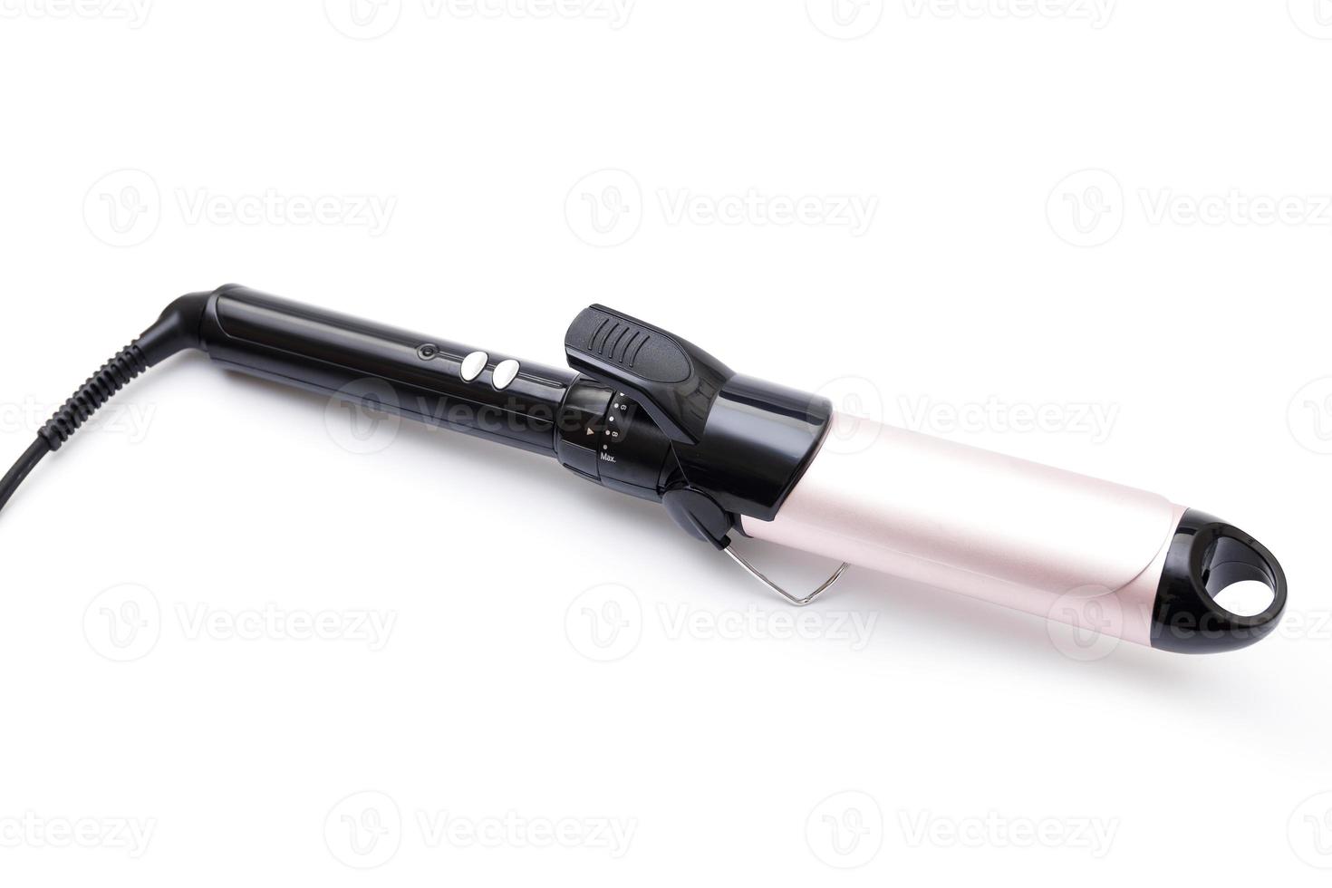Professional hair curler tool on a white background photo