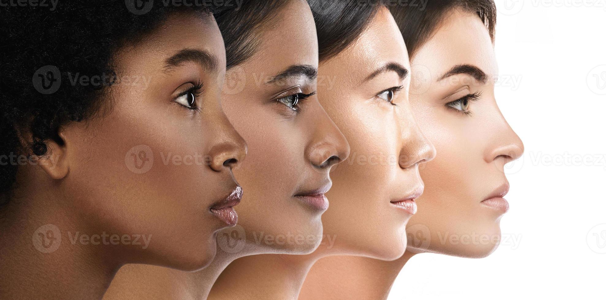 Different ethnicity women - Caucasian, African, Asian and Indian. photo