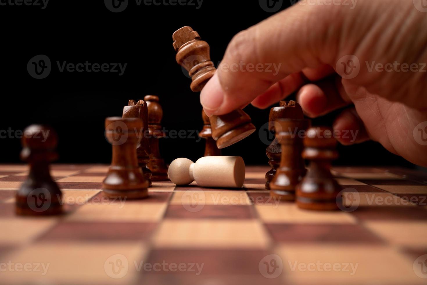 Businessman hands in black suite sitting and pointing chess king on vintage  table meaning of planning and strategy. Decision and achievement goal  concept. 11872620 Stock Photo at Vecteezy