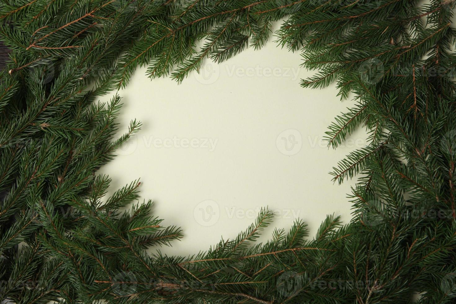 New Year's Eve background with fir branch and cones. Christmas and New Year holidays composition of pine tree branches. Happy New Year 2023 photo