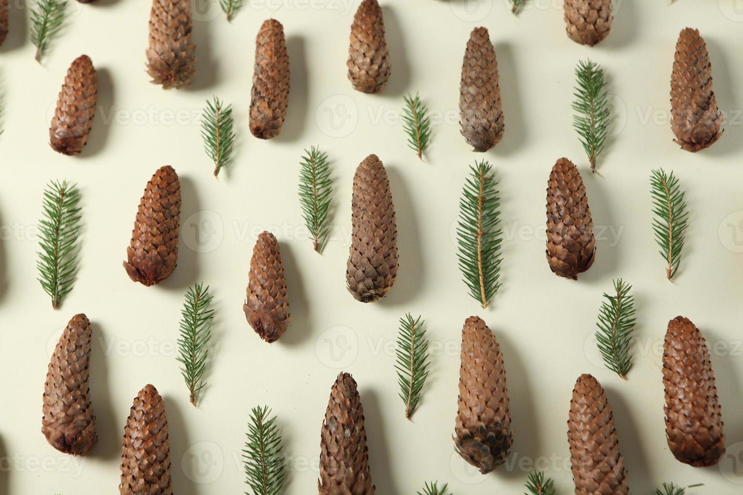 New Year's Eve background with fir branch and cones. Christmas and New Year holidays composition of pine tree branches. Happy New Year 2023 photo