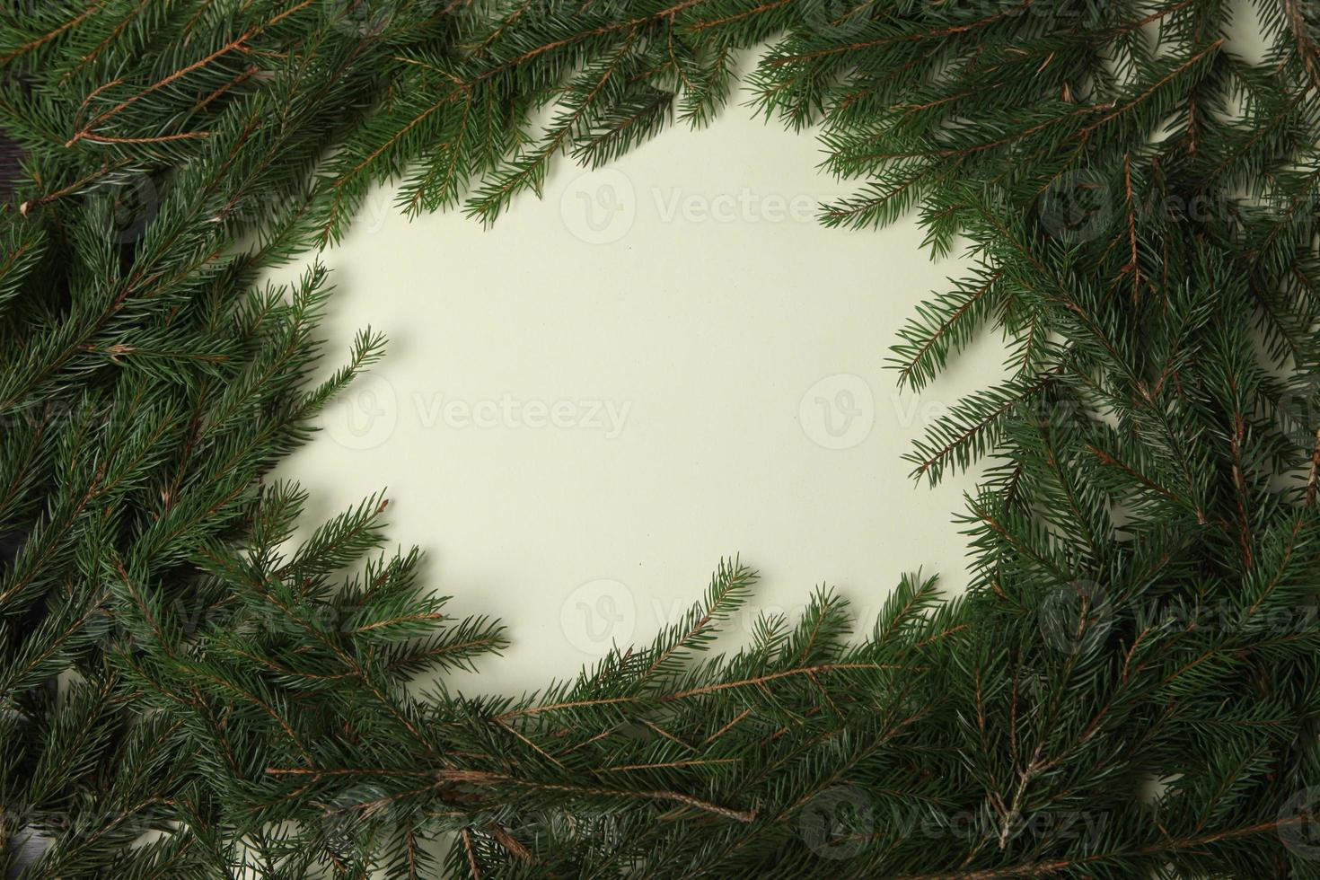 New Year's Eve background with fir branch and cones. Christmas and New Year holidays composition of pine tree branches. Happy New Year 2023 photo