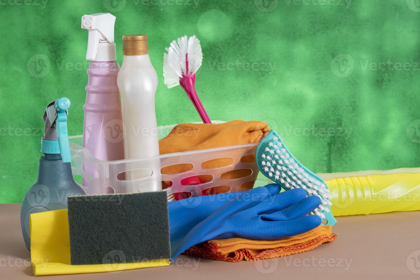 basket with cleaning products for home hygiene use photo