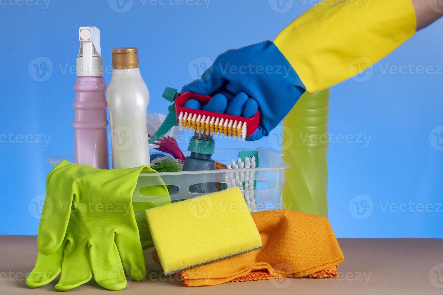 basket with cleaning products for home hygiene use photo