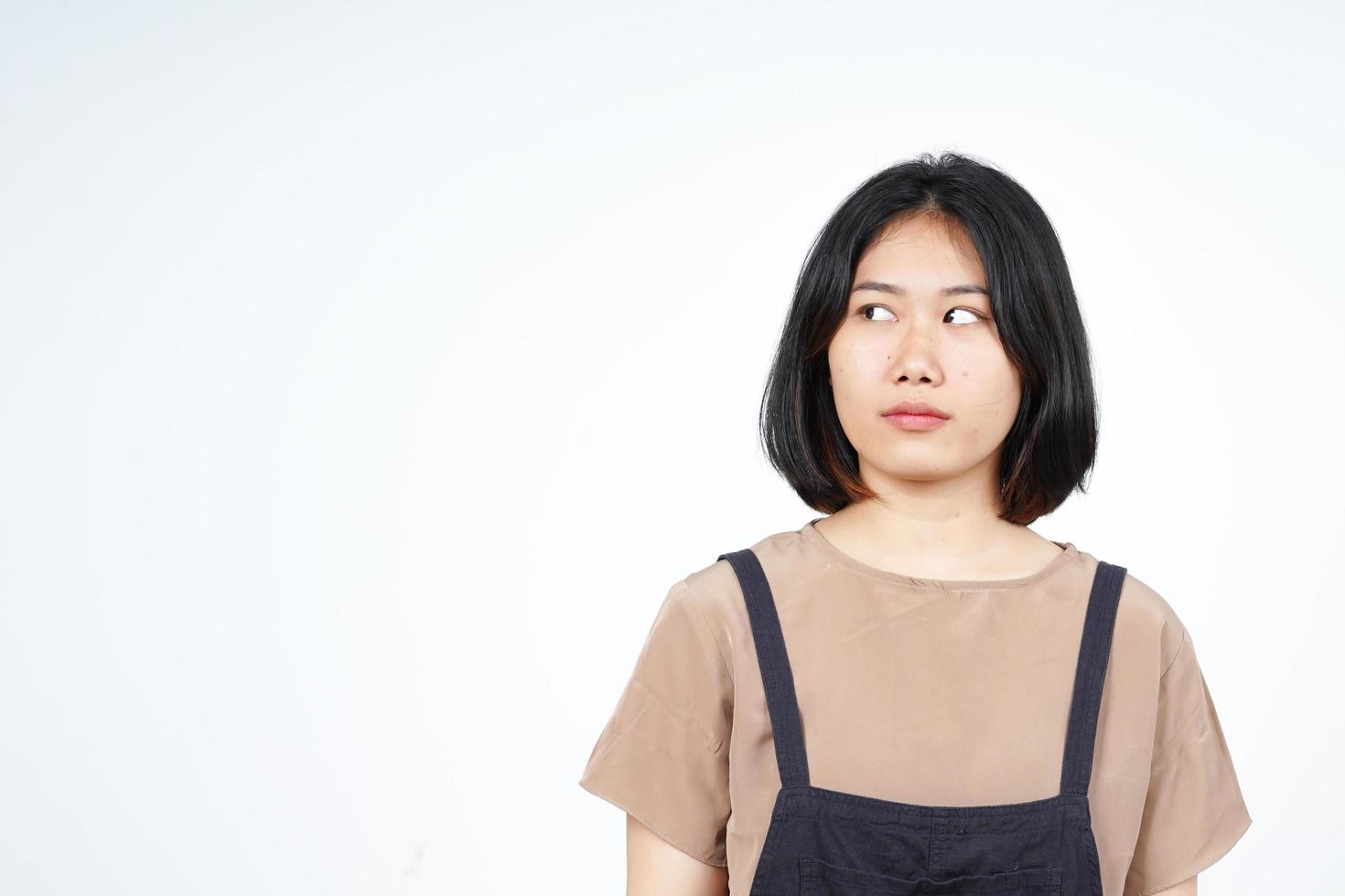 Looking away with bad mood and angry face expression Of Beautiful Asian Woman Isolated On White photo