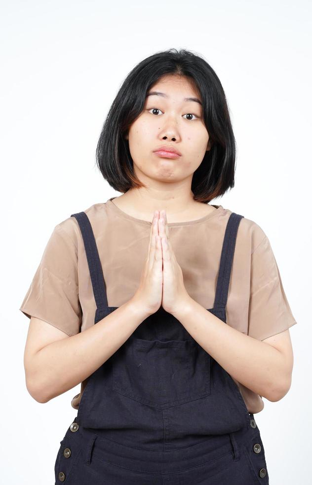 Begging to say sorry Of Beautiful Asian Woman Isolated On White Background photo