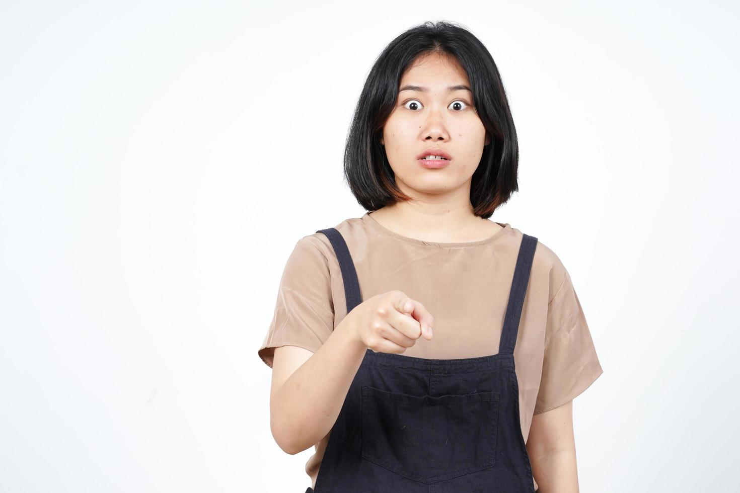 Pointing at you with angry face expression Of Beautiful Asian Woman Isolated On White Background photo