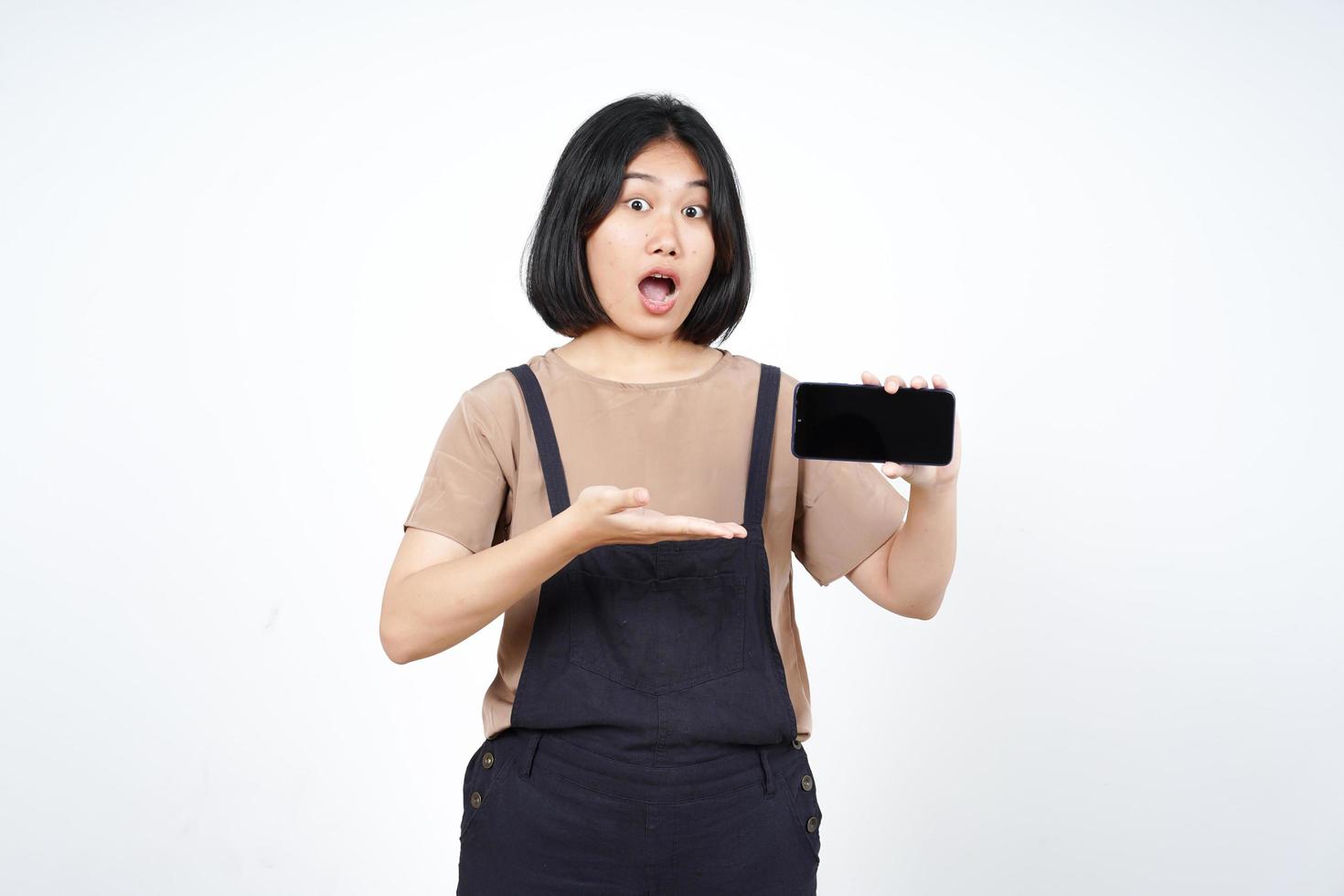 Showing Apps or Ads On Blank Screen Smartphone Of Beautiful Asian Woman Isolated On White Background photo