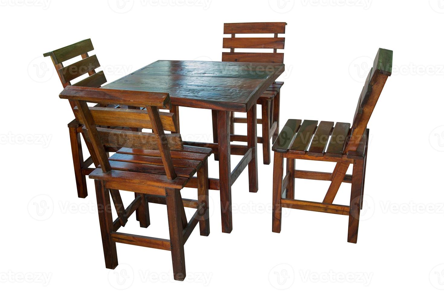Wooden table and chairs set isolated. photo